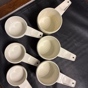 Set of Cream Measuring Cups Tupperware  complete set
